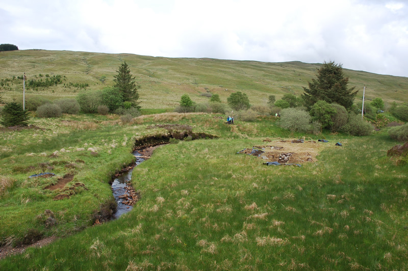 Overall view of Tigh Caol with the trench over the drovers' track 